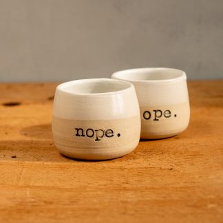 handmade espresso cup with the word nope.